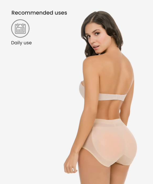 Woman showcasing the high-waisted design of the butt-enhancing padded panty